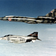 Illustration for article titled 27 high tension photos of NATO jets intercepting Russian warplanes